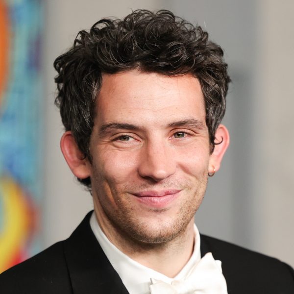 Josh O’Connor’s Hair: Short, Curly Hairstyle With Subtle Taper