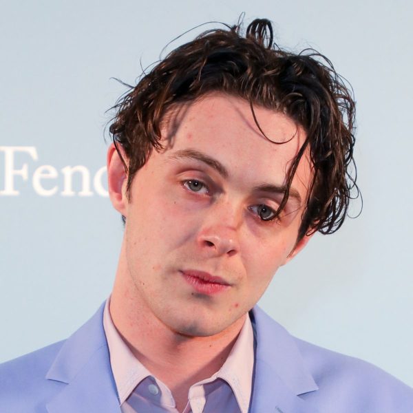 Sonny Hall: Medium Length Wavy Hair Styled With Wet Look